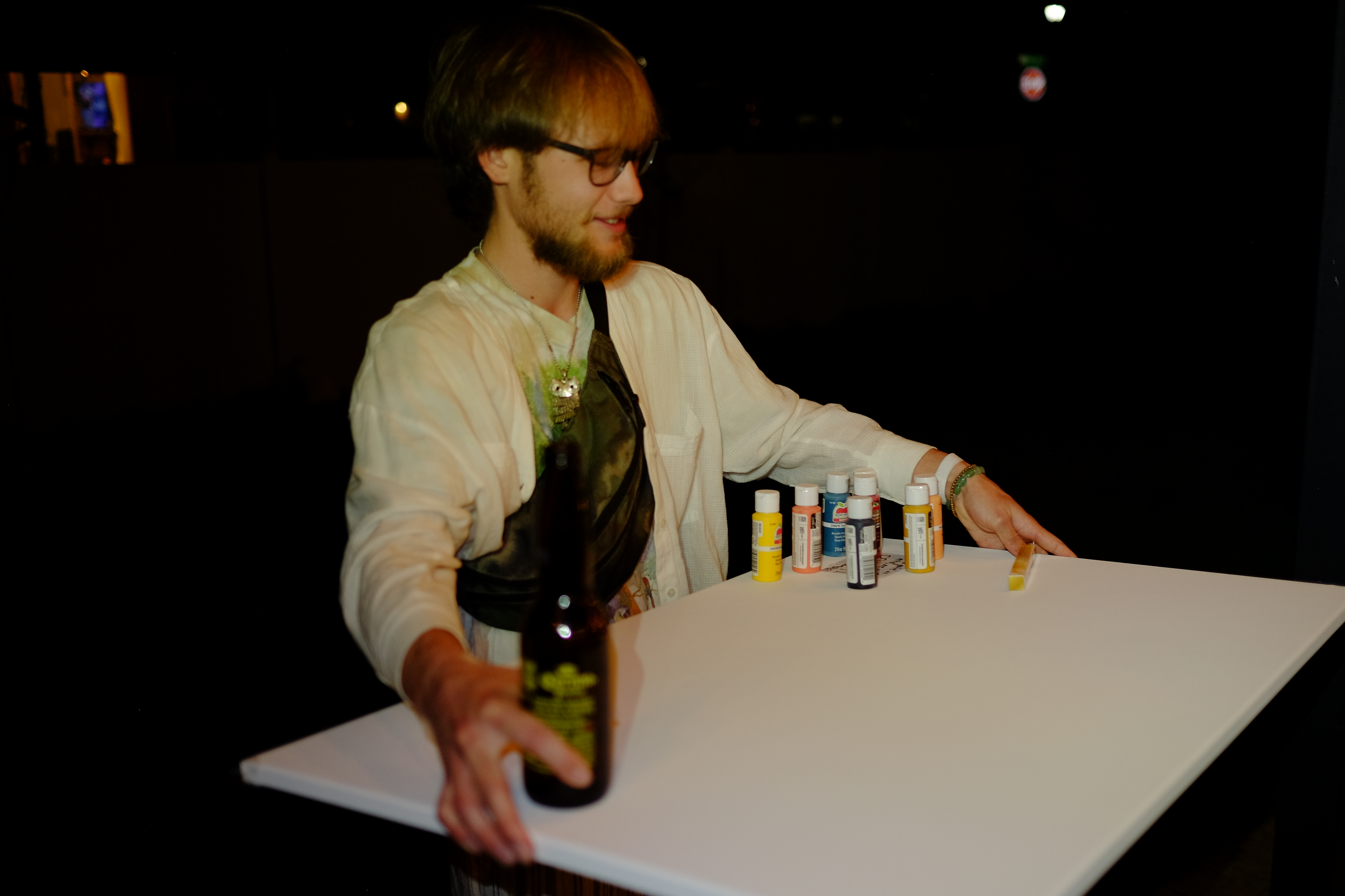 david holding a blank canvas